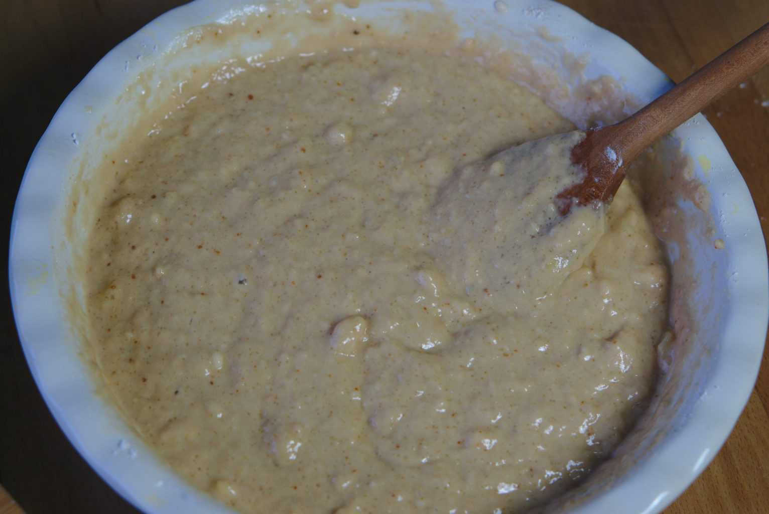 Mixing Vegan Banana muffins ingredients